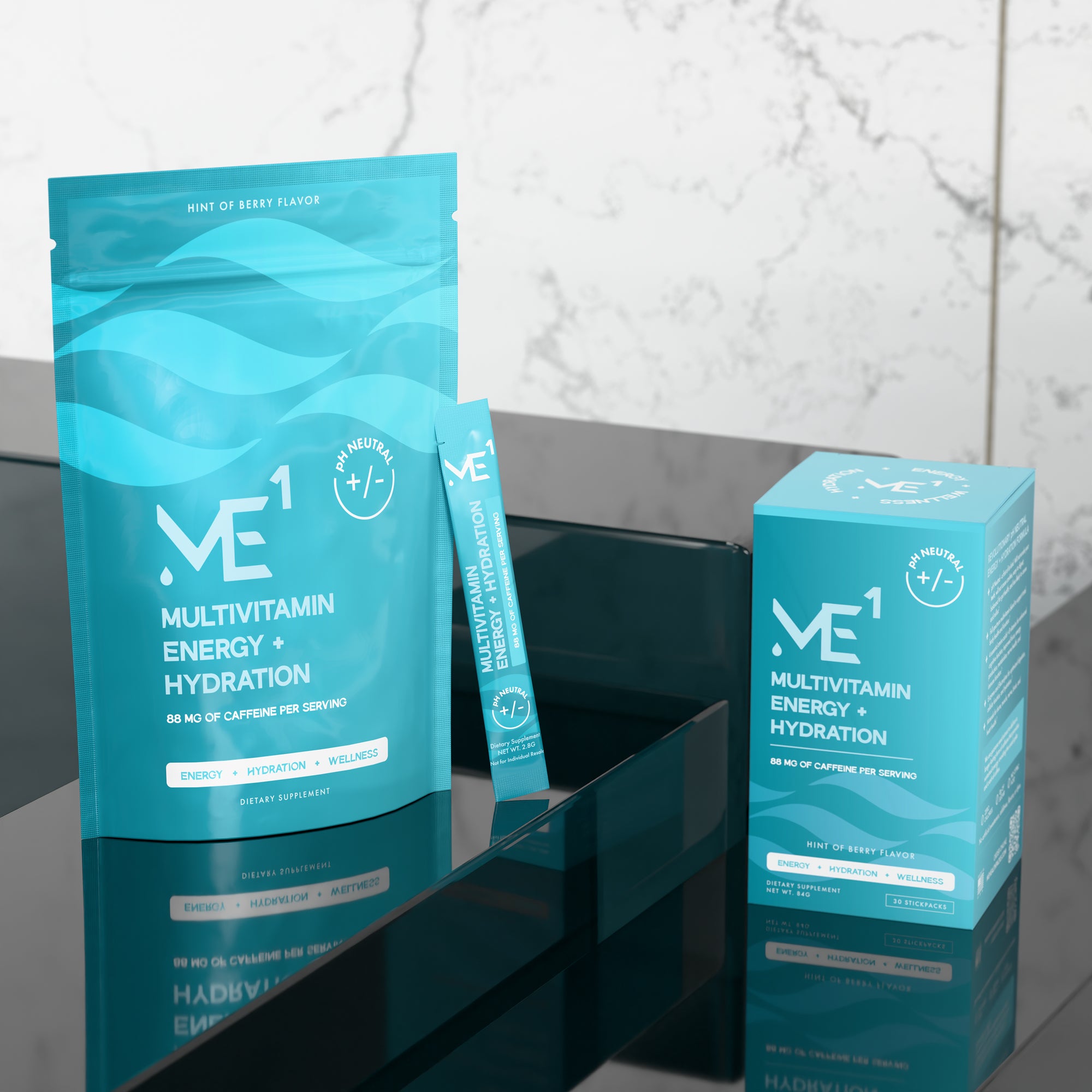 ME1 multivitamin energy hydration package on a reflective surface with marble background